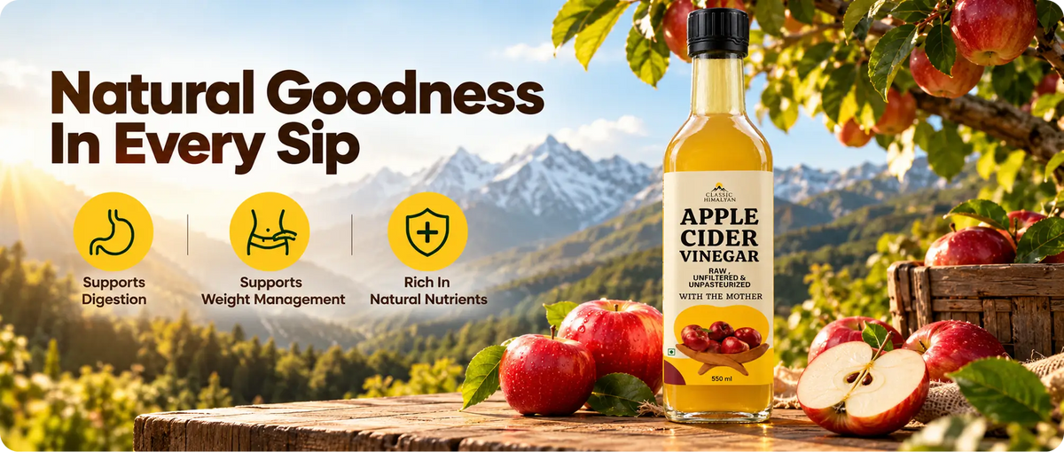 Apple cider vinegar bottle with fresh apples, green leaves, and mountain scenery.