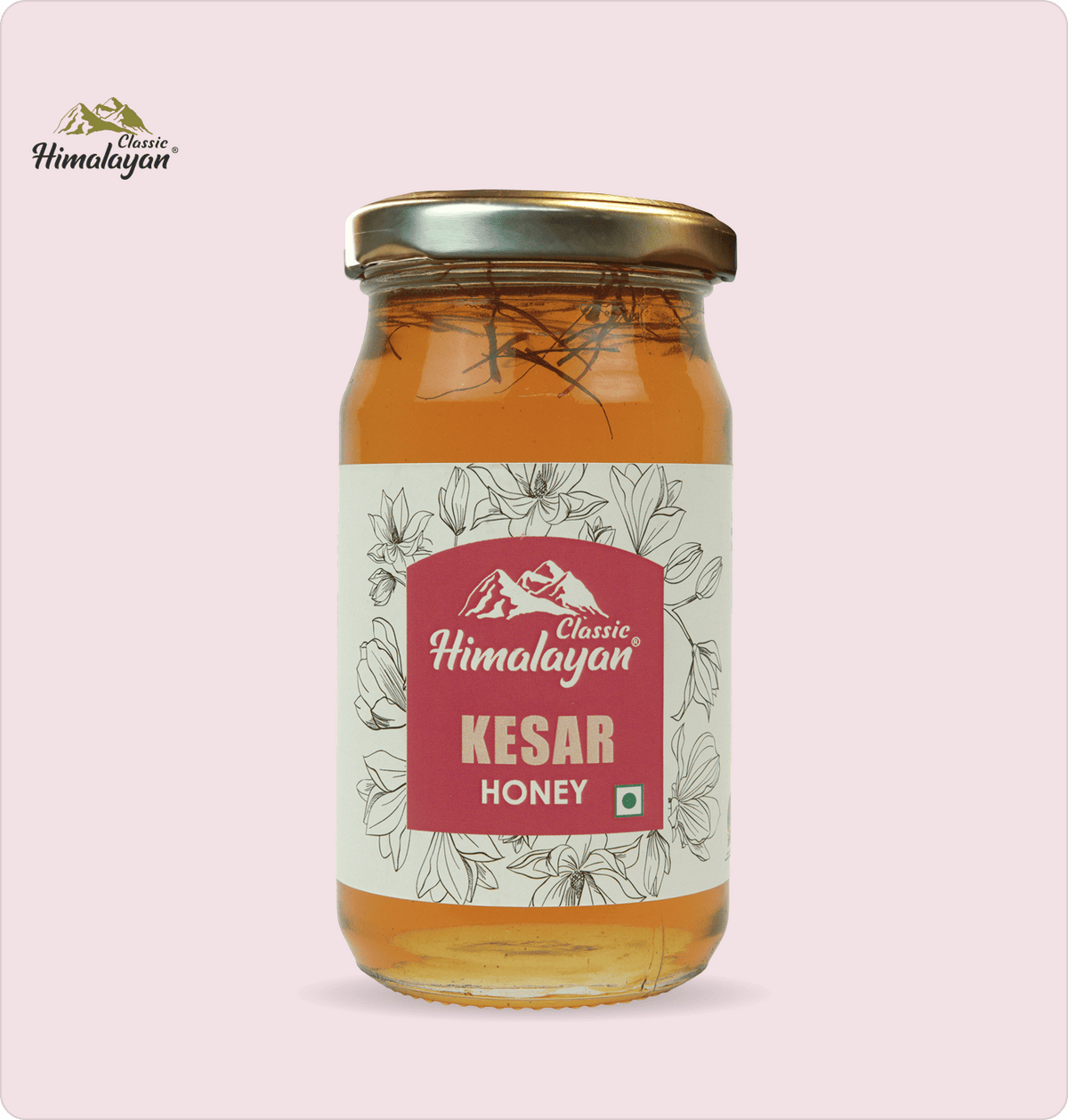 Classic Himalayan Kesar Honey jar on pink background
